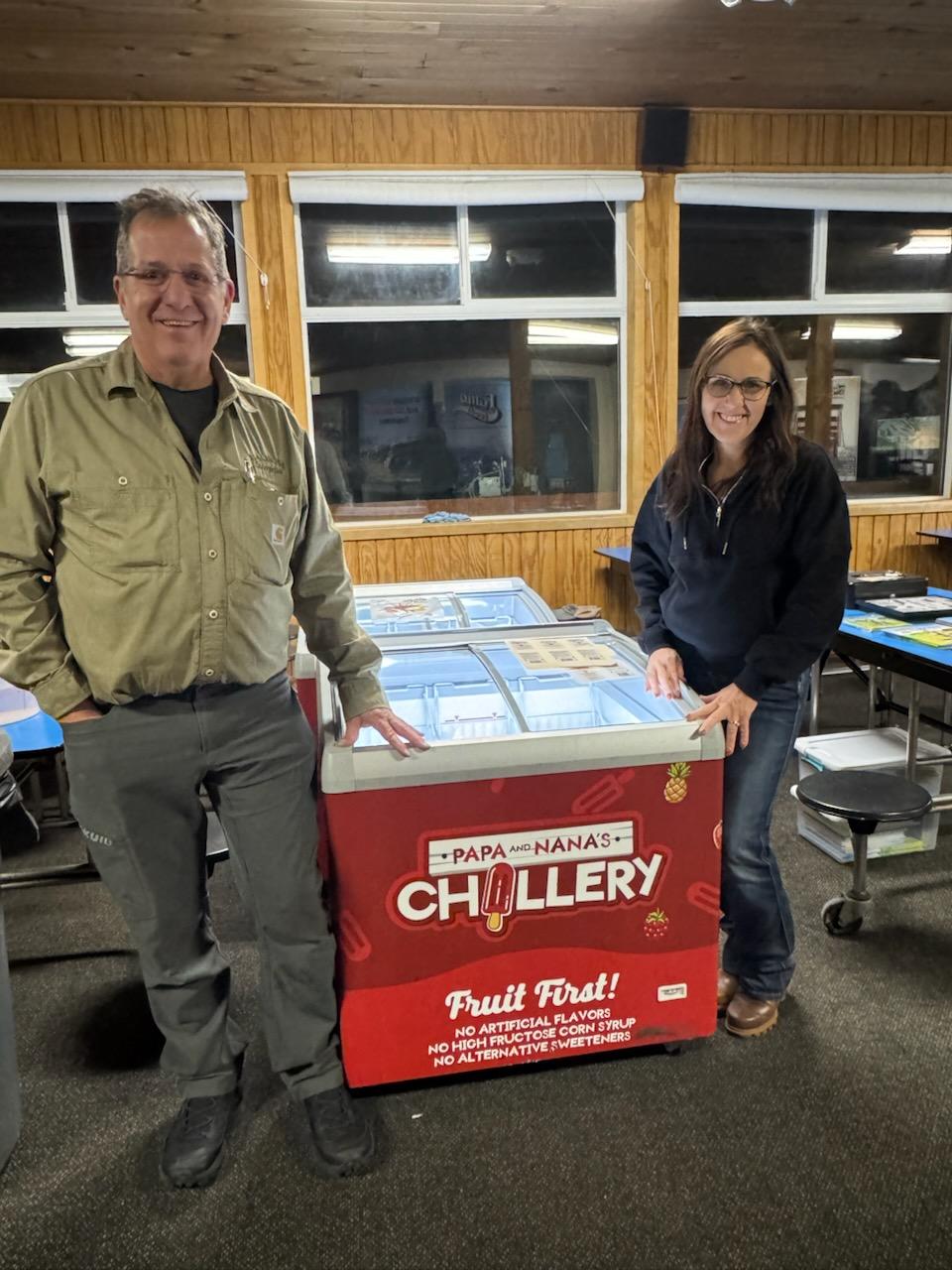 Lux feed customer appreciation 6361 Todd and Louise at an event with popsicles